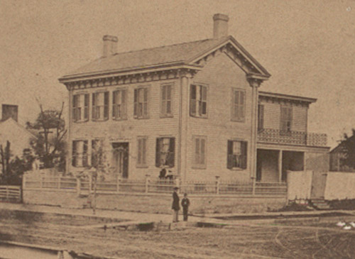 Lincoln in front of his Springfield home
