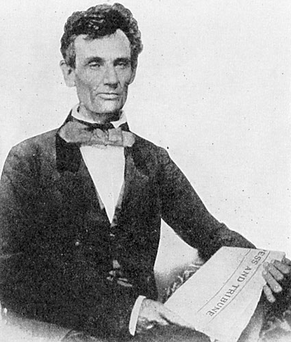 Lincoln holding the "Press and Tribune"